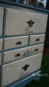 French Inspired Dresser. Blue frame and white drawers with original pulls. Distressed and Antiqued and decorated with French number script and Flur de Lis.